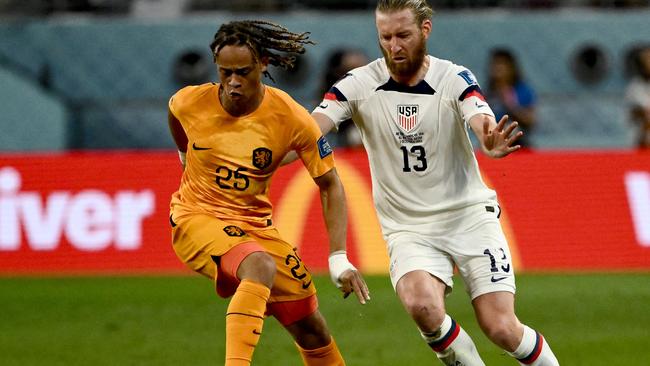 Xavi Simons, whose father is of Surinamese descent, fights for the ball with USA’s defender Tim Ream during their round of 16 match. Picture: AFP