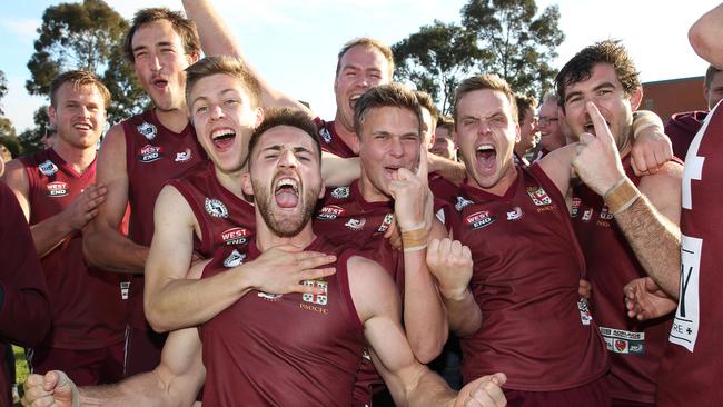 An elated group of Prince Alfred Old Collegians players after winning the club’s first division one premiership in 2016. Picture: Stephen Laffer