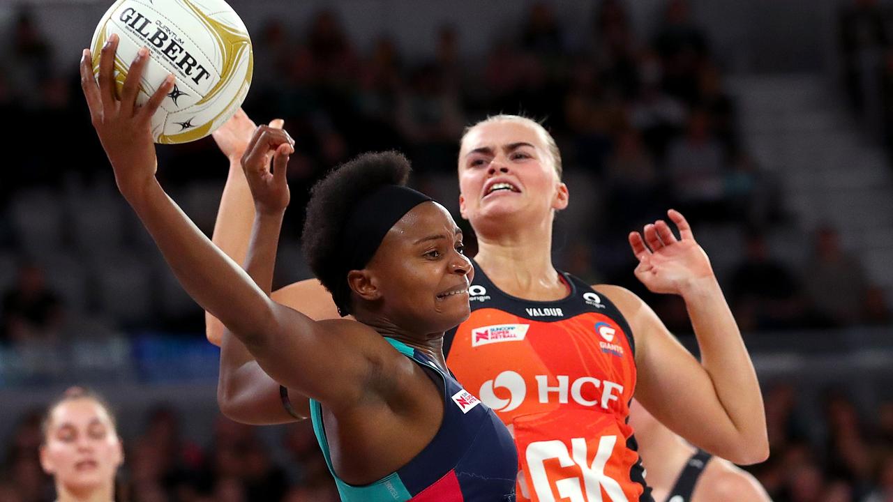 Mwai Kumwenda stretches for the ball during the Super Netball preliminary final at John Cain Arena. Picture: Kelly Defina/Getty Images