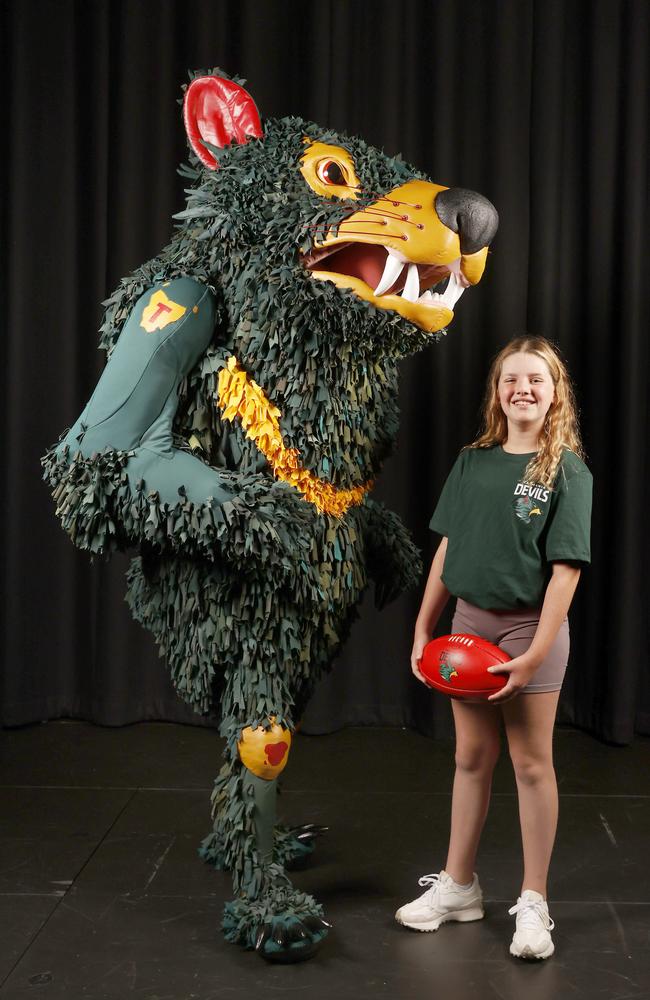 Rum'un with Katie Foale, 11, who is a junior football player at North Hobart Football Club and will also co-host the launch with Jack Riewoldt. Picture: Nikki Davis-Jones