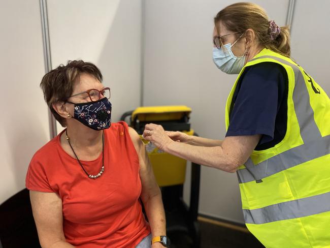 Nurse Judy Beilby, of Kempsey, gets vaccinated for Covid-19 at Port Macquarie's Grant St clinic.