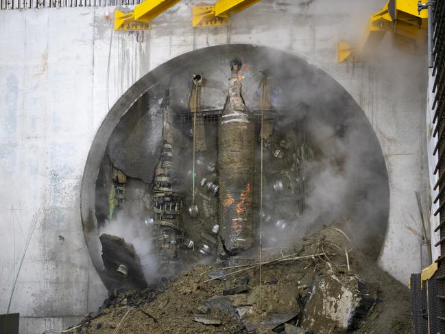 Still of Metro Tunnel boring machine breaking through at Parkville.