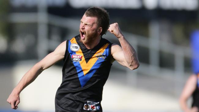 Salisbury West’s Steven Wellington celebrates kicking one of his side’s three goals – and one of only six for the game – in the division seven grand final at Alberton Oval on Saturday. Picture: Dylan Coker.