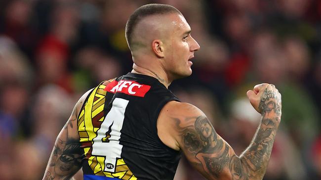 MELBOURNE, AUSTRALIA - MAY 25: Dustin Martin of the Tigers celebrates kicking a goal during the round 11 AFL match between Richmond Tigers and Essendon Bombers at Melbourne Cricket Ground, on May 25, 2024, in Melbourne, Australia. (Photo by Quinn Rooney/Getty Images)