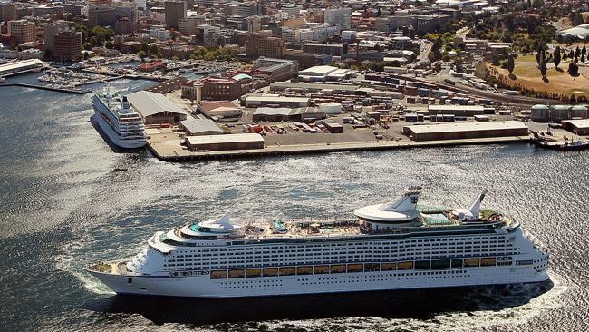 The Crystal Symphony, docked, and Voyager of the Seas were two cruise ships that made up 