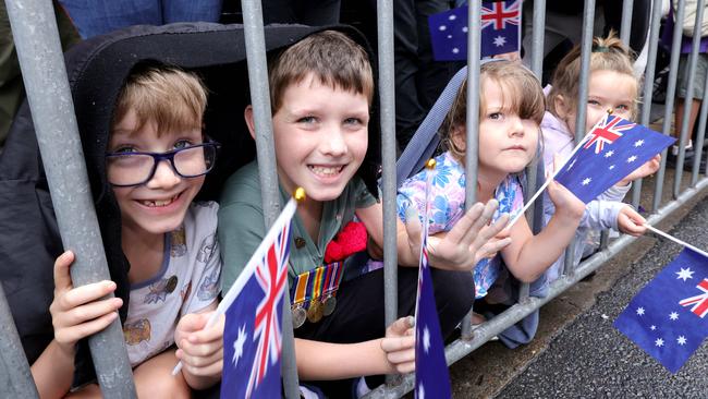 L to R, Ashton Windsor 8yrs. Hudson Sykes 8yrs (wearing Great great grandfather medals) Willow Windsor 5 yrs. Arya Sykes 4yrs, during the Anzac Day Parade, Brisbane City. Photo: Steve Pohlner