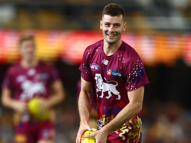 BRISBANE, AUSTRALIA - MAY 05: Josh Dunkley of the Lions warms up during the round eight AFL match between Brisbane Lions and Gold Coast Suns at The Gabba, on May 05, 2024, in Brisbane, Australia. (Photo by Chris Hyde/AFL Photos/via Getty Images )