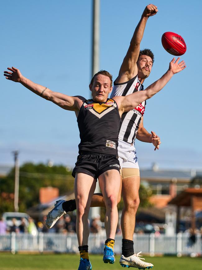 Shane Harvey and Chase Bower in the match between Brighton and Payneham. Picture: Matt Loxton