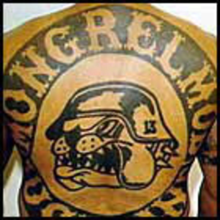 Tattoo on back of member of Mongrel Mob gang in Wanganui, North Island, New Zealand.