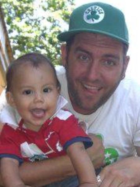 Gold Coast murder victim Omega Ruston with his son Tommy.