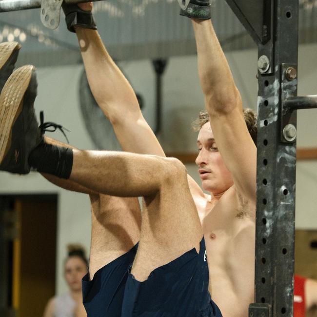 James McGowan performing toes to bar movement. Picture: Marty Strecker