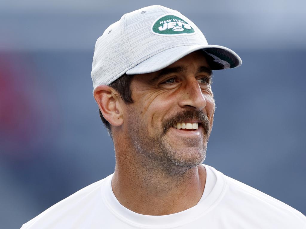 EAST RUTHERFORD, NEW JERSEY - AUGUST 19: Aaron Rodgers #8 of the New York Jets throws the ball during warmups before the first half of a preseason game against the Tampa Bay Buccaneers at MetLife Stadium on August 19, 2023 in East Rutherford, New Jersey. (Photo by Sarah Stier/Getty Images)