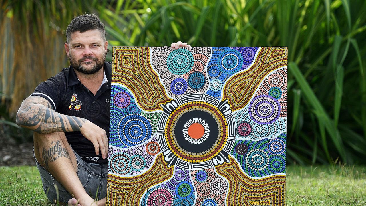 Local artist Chris Gray has donated a piece of his indigenous artwork to the Townsville University Hospital's childrens ward after picking up the hobby following a 15 year break. PICTURE: MATT TAYLOR.