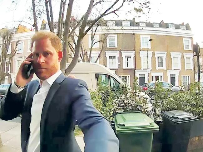 Prince Harry was spotted knocking at a door in Fulham on a doorbell camera. Picture: The Sun