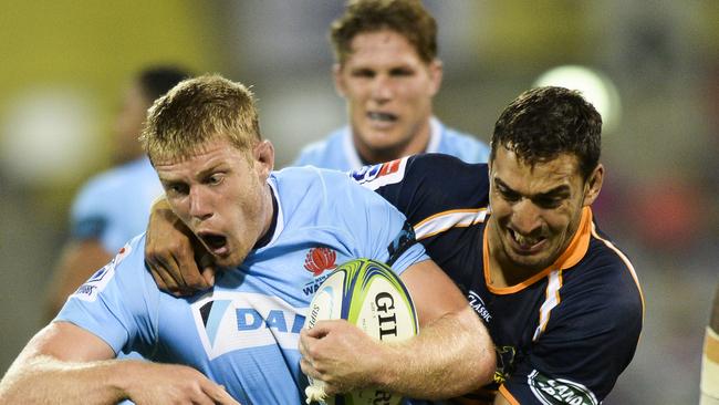 Tom Staniforth of the Waratahs (left) is tackled by Rory Arnold of the Brumbies during the Round 7 Super Rugby match between the Brumbies and the NSW Waratahs at GIO Stadium in Canberra, Saturday, March 31, 2018. (AAP Image/Rohan Thomson) NO ARCHIVING, EDITORIAL USE ONLY