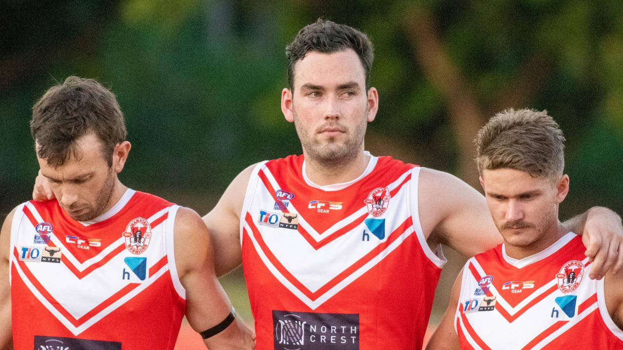 The Waratahs pay tribute to late, great ruckman Alexander ‘Rooch’ Aurrichio at the first game under lights at Gardens Oval. Picture: Aaron Black/AFLNT Media