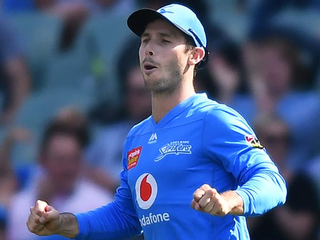 ADELAIDE, AUSTRALIA - JANUARY 08: Jon Wells of the Strikers celebrates after catching the wicket of  Josh Philippe of the Sixers during the Big Bash League match between the Adelaide Strikers and the Sydney Sixers at the Adelaide Oval on January 08, 2020 in Adelaide, Australia. (Photo by Mark Brake/Getty Images)