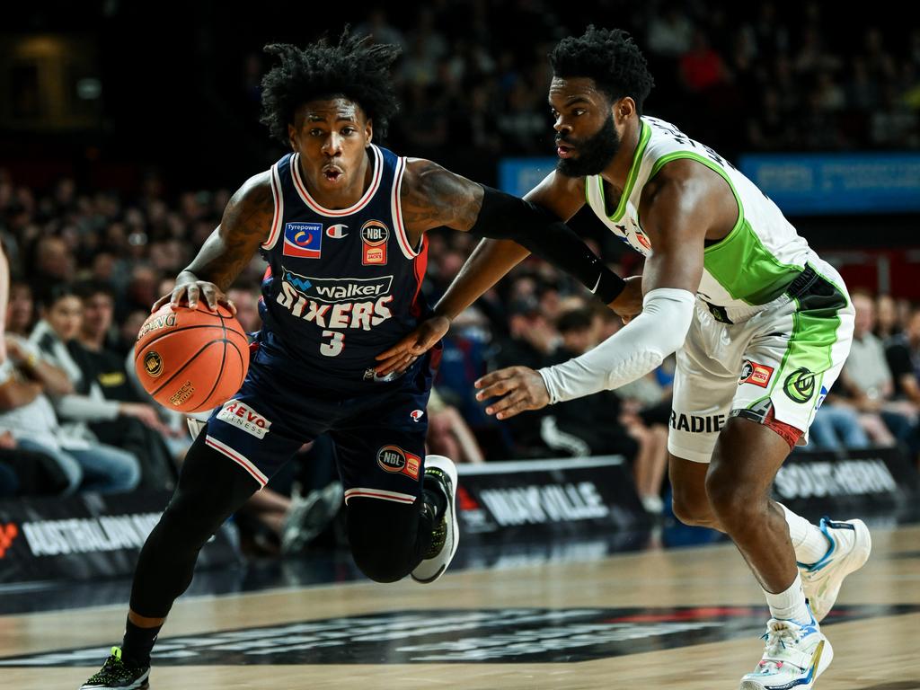 Kendric Davis of the 36ers competes with Derrick Walon Jr of the Phoenix during the round three NBL match between Adelaide 36ers and South East Melbourne Phoenix at Adelaide Entertainment Centre, on October 03, 2024, in Adelaide, Australia. (Photo by Mark Brake/Getty Images)