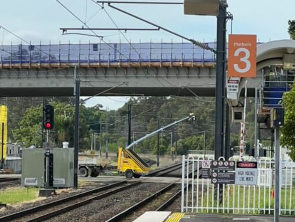 The vehicle that struck powerlines, forcing trains to be suspended.