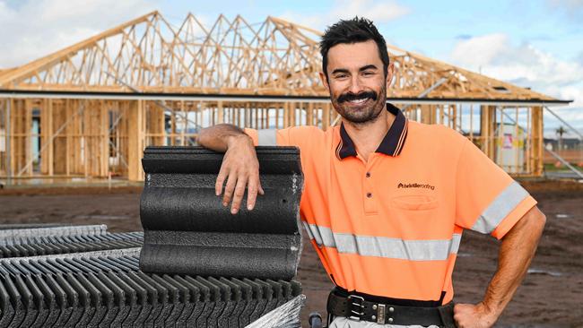 JUNE 20, 2024: Roof tiler Mat Kennett working at Riverlea Park. Picture: Brenton Edwards