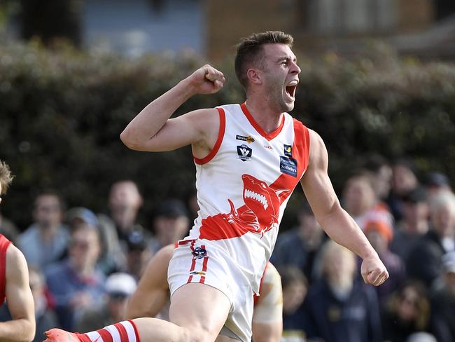 James Hallahan celebrates a goal during the MPNFL Division 1 grand final between The Pines and Sorrentoin Frankston, Sunday, Sept. 16, 2018. Picture: Andy Brownbill)