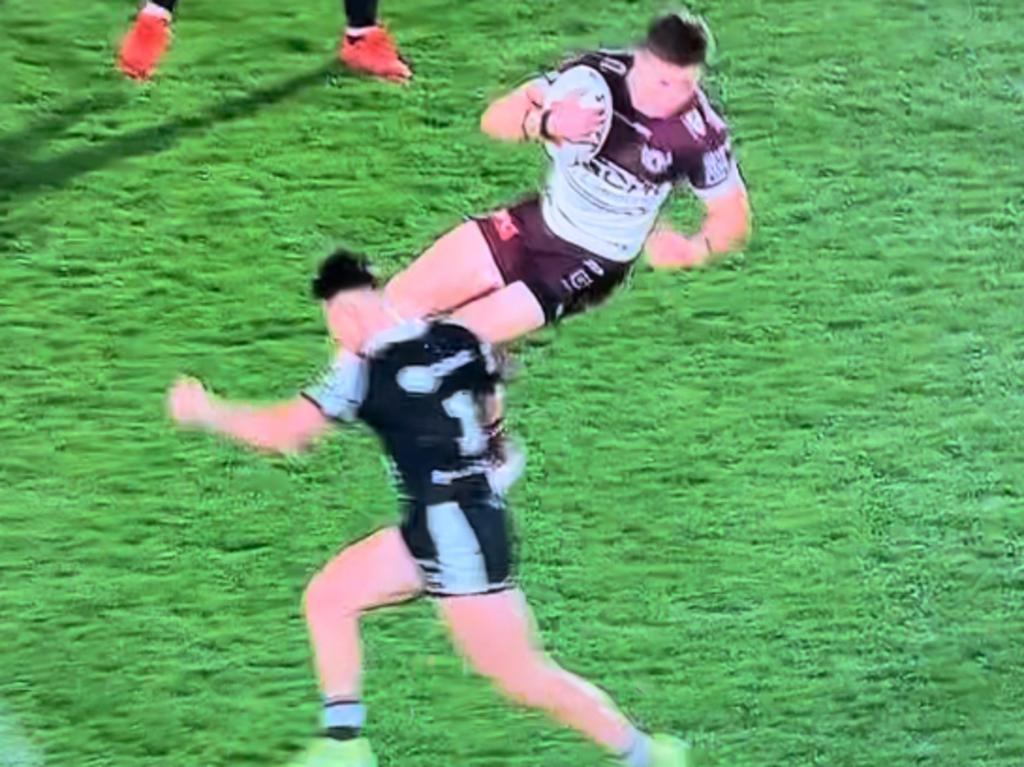 Manly's Reuben Garrick left with fractured back after this tackle.
