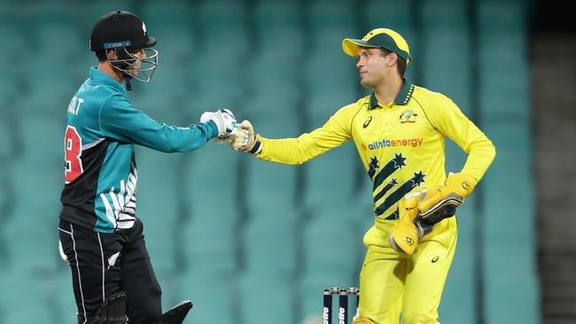 Alex Carey of Australia taps fists with Trent Boult of New Zealand at the finish of Friday night’s ODI clash at the SCG. Picture: Getty Images