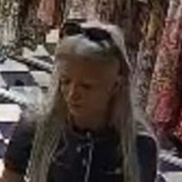 Police are seeking this woman, who they believe may be able to assist them with their investigation into the alleged theft of a dress from a Harbour Town store.