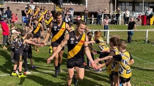 Portland captain Daniel Jackson leads his team onto the ground for the match against North Warrnambool. Picture: Supplied