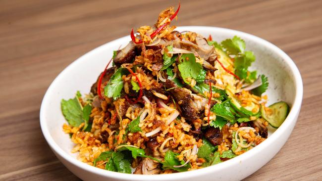 Roast duck and crispy rice salad with lychee, with coriander and chilli jam dressing is one of the colourful Thai dishes at Salted Egg at Quincy Melbourne. Picture: Mark Stewart.