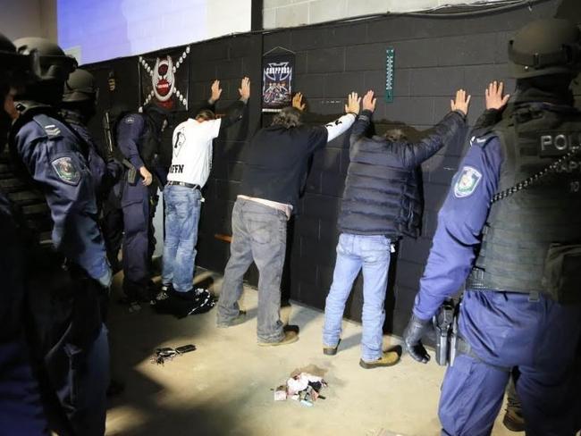 Hundreds of guns seized, kilos of drugs destroyed, and thousands of bikies charged by Strike Force Raptor in raids like this on the Nomads in Singleton, NSW. Picture: NSW Police.