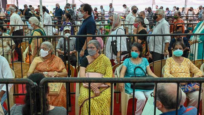 People queue for a Covid-19 vaccine in Mumbai. Picture: AFP