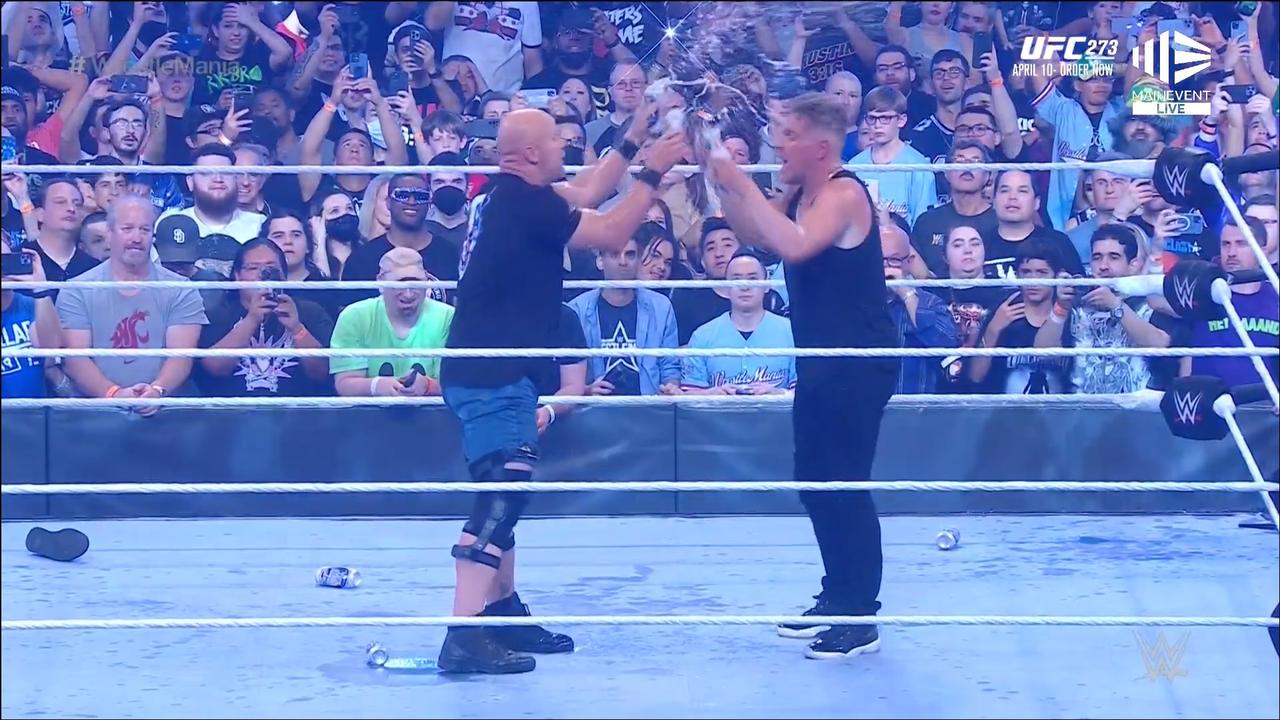 Steve Austin and Pat McAfee share a beer before the next betrayal. Photo: WWE.