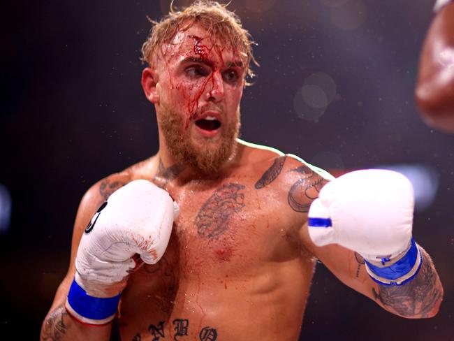 TAMPA, FLORIDA - DECEMBER 18: Jake Paul fights Tyron Woddley during a Paul Woodley II on December 18, 2021 in Tampa, Florida.   Mike Ehrmann/Getty Images/AFP == FOR NEWSPAPERS, INTERNET, TELCOS & TELEVISION USE ONLY ==