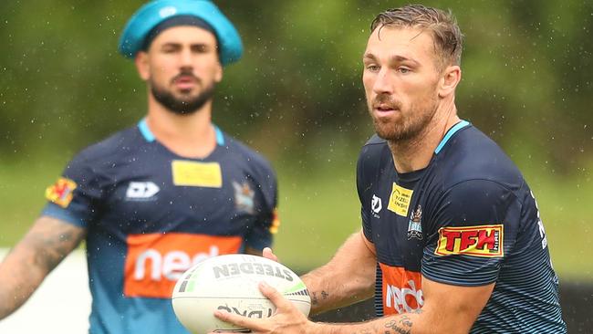 GOLD COAST, AUSTRALIA - MARCH 09: Bryce Cartwright passes during a Gold Coast Titans NRL training session at Titans High Performance Centre on March 09, 2020 in Gold Coast, Australia. (Photo by Chris Hyde/Getty Images)