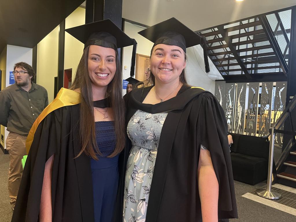 Graduates from the University of the Sunshine Coast's Fraser Coast campus celebrating at the Brolga Theatre.