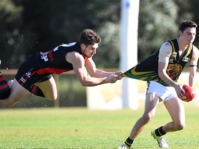 Nepean FL: Frankston v Dromana at Baxter Park. Frankston's #2 Dale Sutton makes a successful flying tackle on Dromana's #11 Jordan McCulley. Picture: Jason Sammon Saturday 30 July 2016