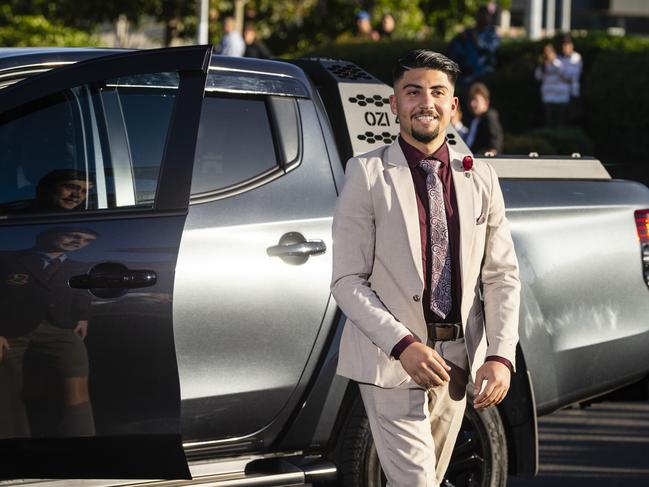 Abdulrahman Hassan arrives at Harristown State High School formal at Highfields Cultural Centre, Friday, November 18, 2022. Picture: Kevin Farmer