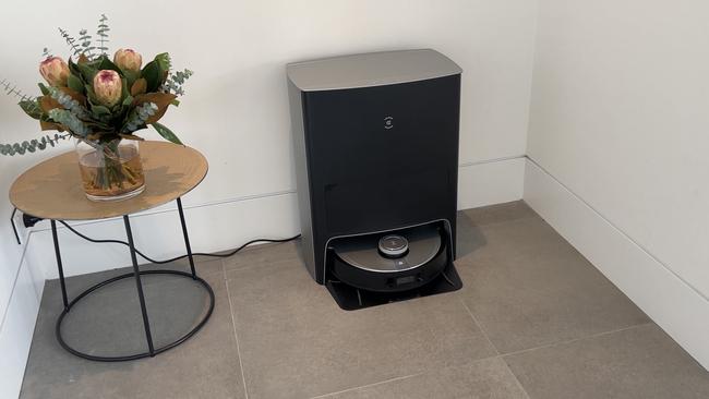 The DEEBOT X1 OMNI has a base station which houses the water required for mopping and has a bin bag installed so the vacuum can auto-empty dirt and dust after a clean. Picture: Elly Awesome