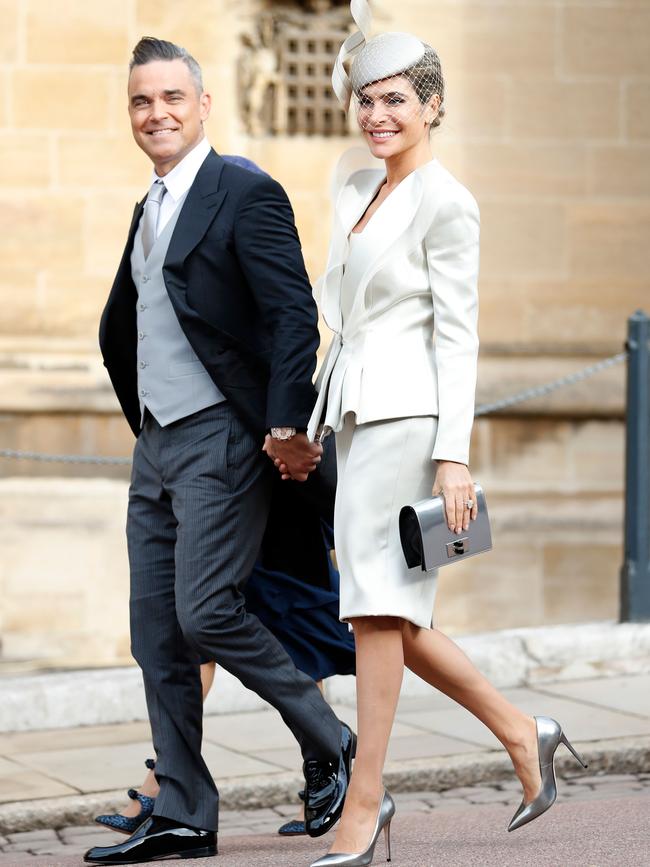 Williams with wife Ayda Field attending the Royal wedding of Princess Eugenie. (Picture: Alastair Grant/AFP)