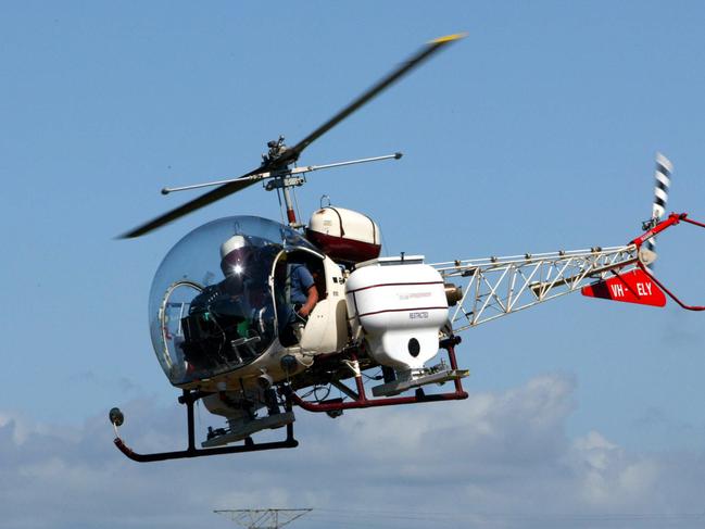 02 Apr 2004 Helicopter similar to the Bell 47 Helicopter from McDermott Aviation which crashed at Schultz Canal at Nudgee Beach today.  PicDarren/England helicopters