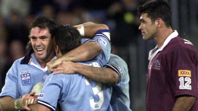 NSW players celebrate during game three of the 2000 series, the last time the Blues won a series 3-0. Picture: Brett Faulkner