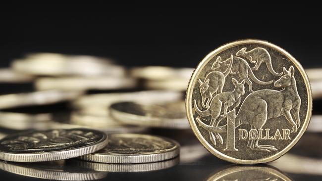 Australian dollar coins on a dark reflective background. Picture: iStock