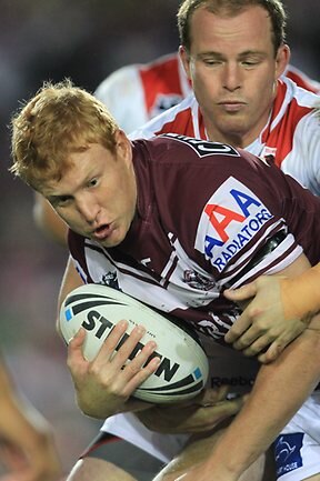 <p>NRL round 13 Sea Eagles v Dragons: Daniel Harrison tackled by Beau Scott. Picture: Mark Evans</p>