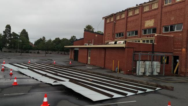 The grandstand roof in the oval’s carpark the morning after the storm. Picture: Calum Robertson