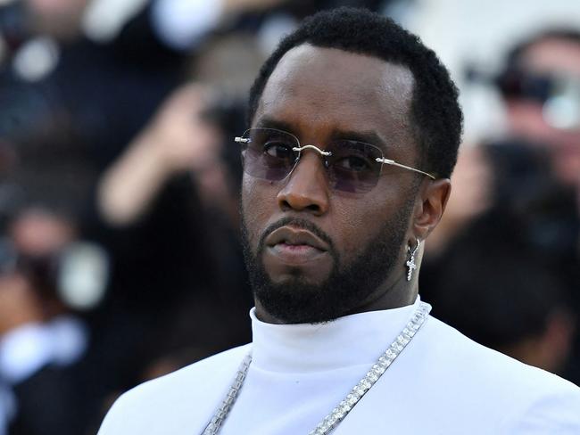 (FILES) Sean "Diddy" Combs arrives for the 2018 Met Gala on May 7, 2018, at the Metropolitan Museum of Art in New York. More than 100 alleged victims are to sue rapper Sean "Diddy" Combs and others for rape, sexual assault and sexual exploitation, a US lawyer announced on October 1, 2024. (Photo by Angela WEISS / AFP)