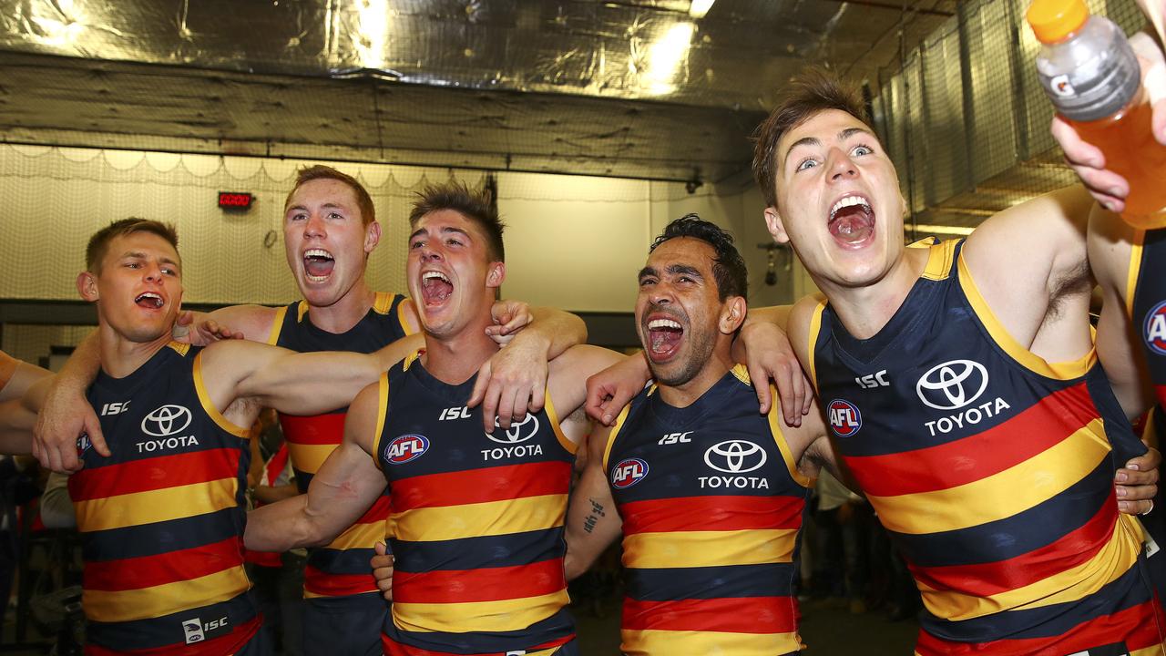 David Mackay, Tom Lynch, Riley Knight, Eddie Betts and Jake Kelly sing the club song after the Crows’ 2017 preliminary final win. Picture: Sarah Reed