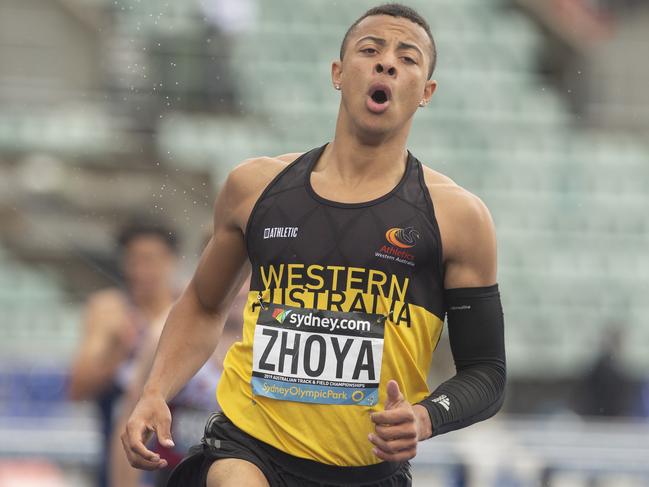 Sasha Zhoya of Western Australia wins the U/18's 110 m men's final  during the Australian Track and Field Championships at Sydney Olympic Park in Sydney, Friday, April 5, 2019. (AAP Image/Steve Christo) NO ARCHIVING, EDITORIAL USE ONLY