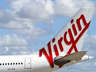 The new Virgin Australia logo on the tail of one of the Airbus A330 aircraft during announcement of rebranding from Virgin Bl...