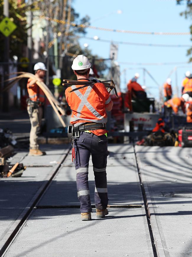 Workers on the Devonshire St light rail project. Picture: Brett Costello